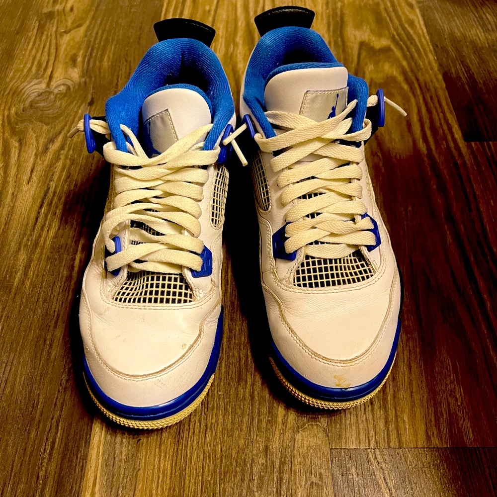 White, blue, and black Air Jordan’s